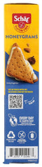 Schar Honeygrams smore setup suggests tasty pairing for camping or dessert.