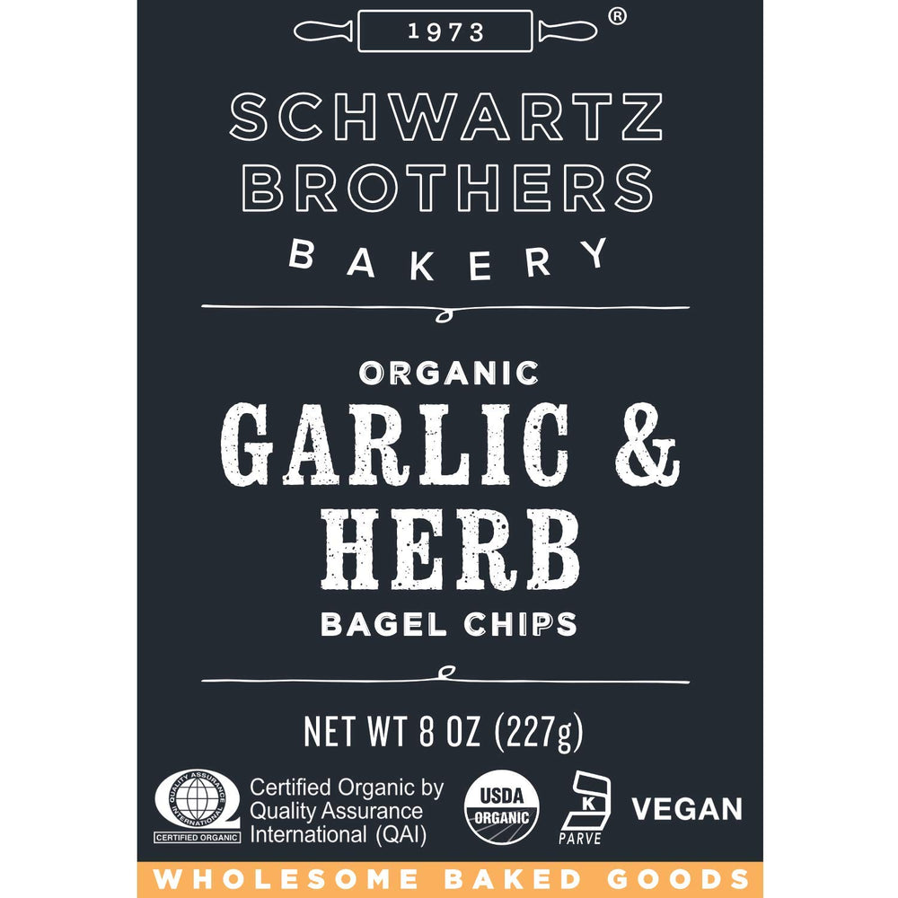 Twice-baked crunch of Schwartz Brothers garlic herb bagel chips near dips