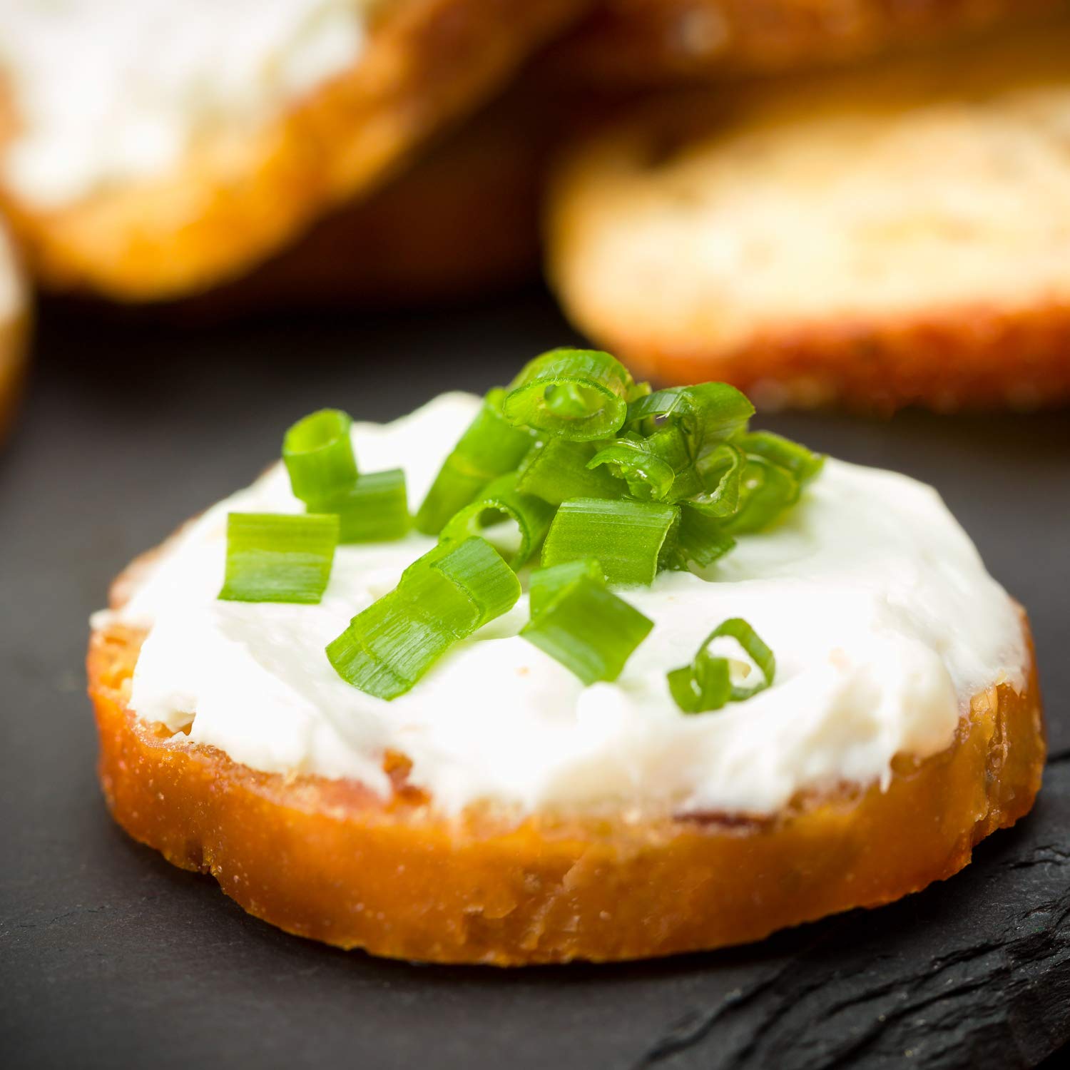 Schwartz Brothers NY-style garlic herb bagel chips add savory salad crunch