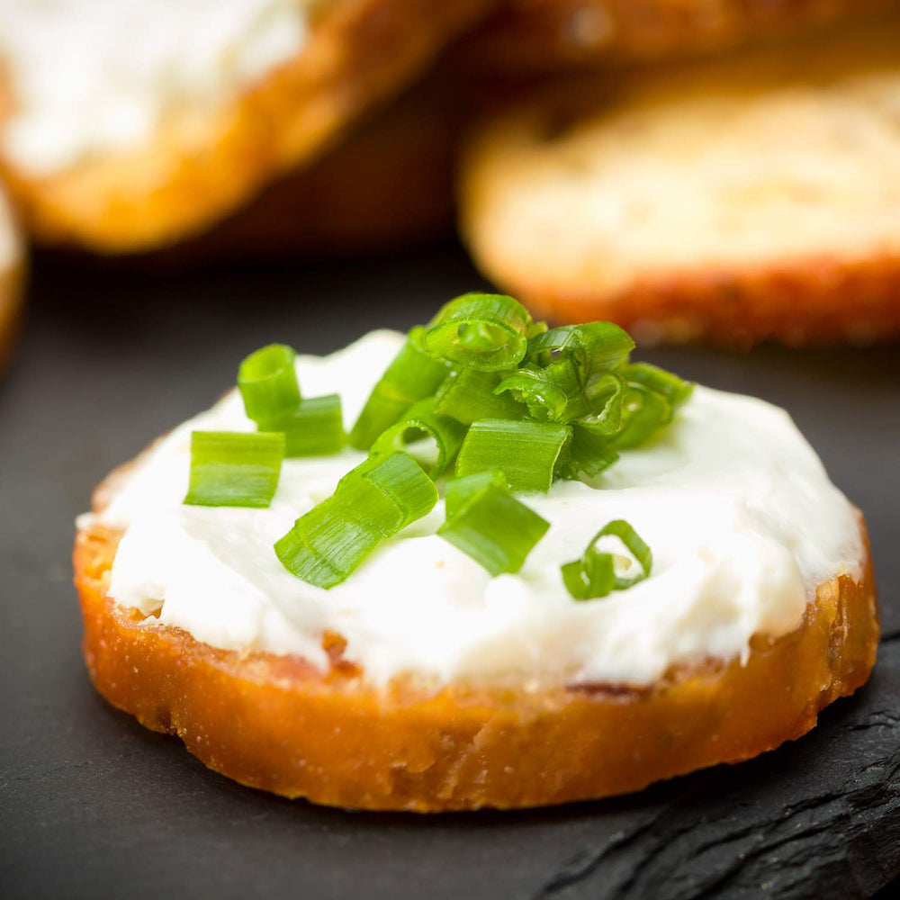 Schwartz Brothers NY-style garlic herb bagel chips add savory salad crunch