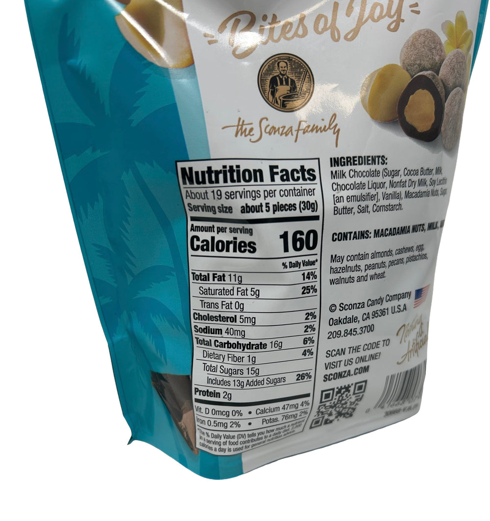 Sconza Crunchy Toffee Milk Chocolate Macadamias dusted with powdered sugar, ready to enjoy.