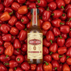 Scrappy's Fire Tincture bottle close-up highlights premium ingredients for bold flavor.