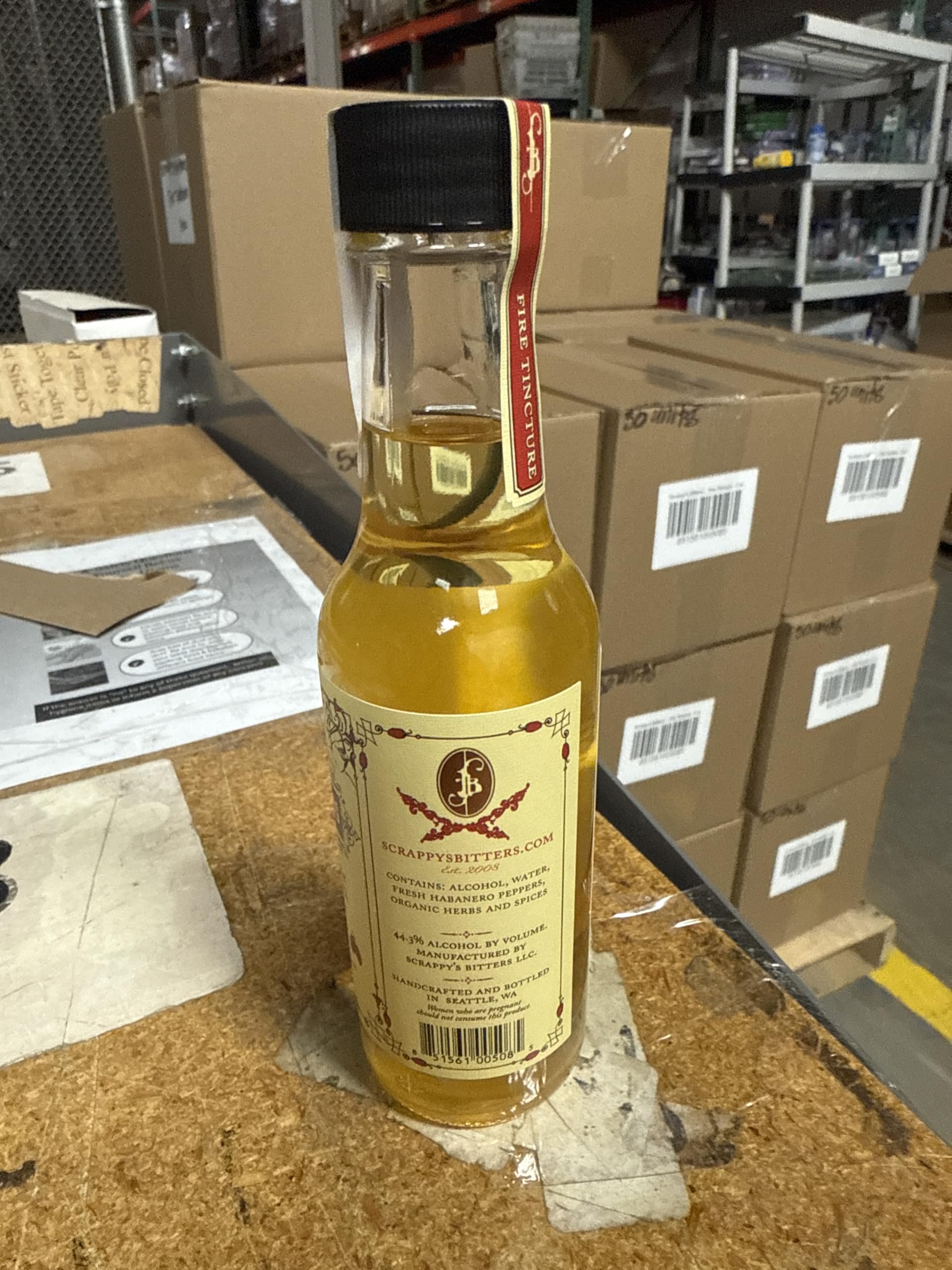 In-store display featuring Scrappy's Fire Tincture to attract adventurous cooks.