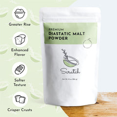 Scratch diastatic malt powder being scooped to mix into dough