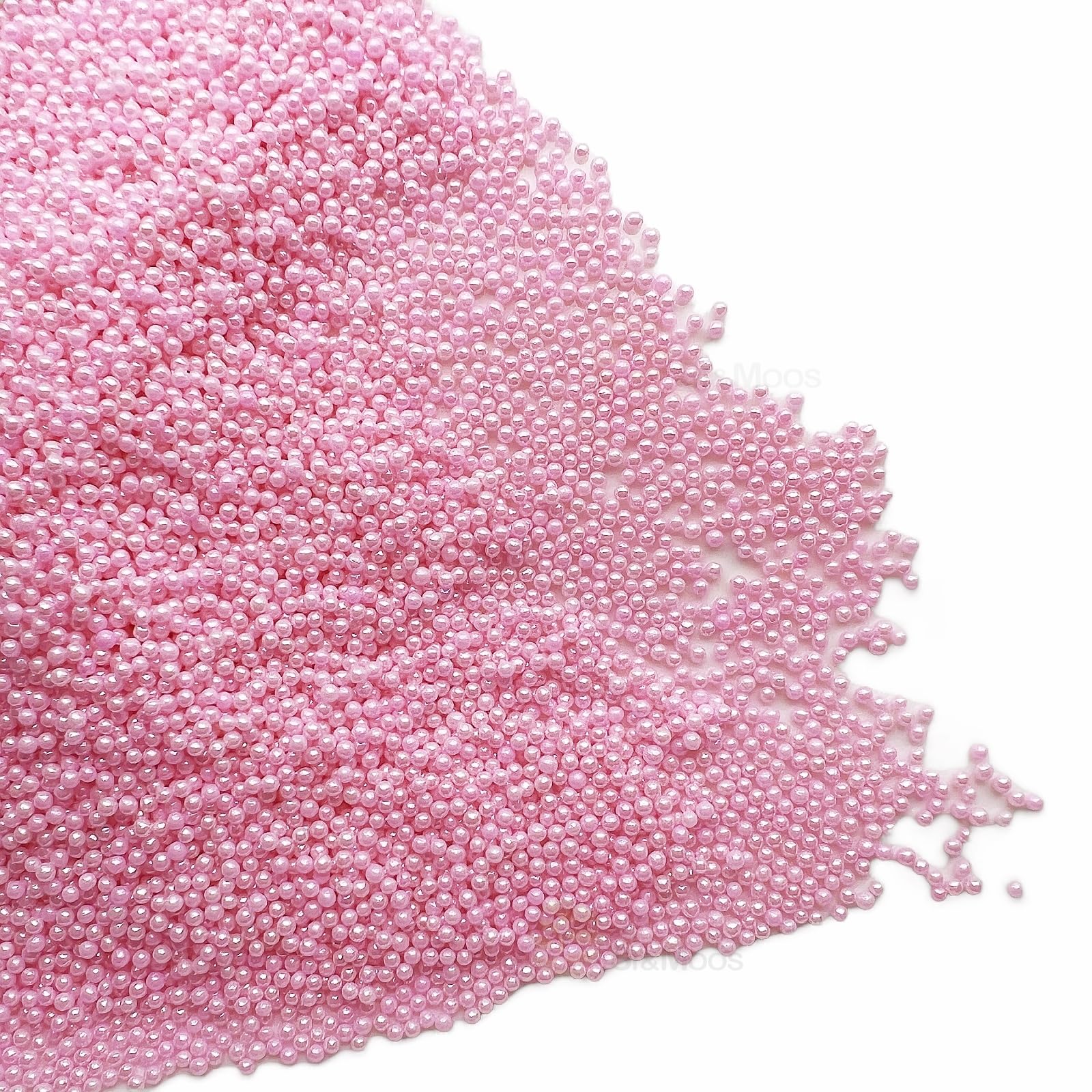 SE SI&MOOS cookies decorated with pink nonpareil pearls.