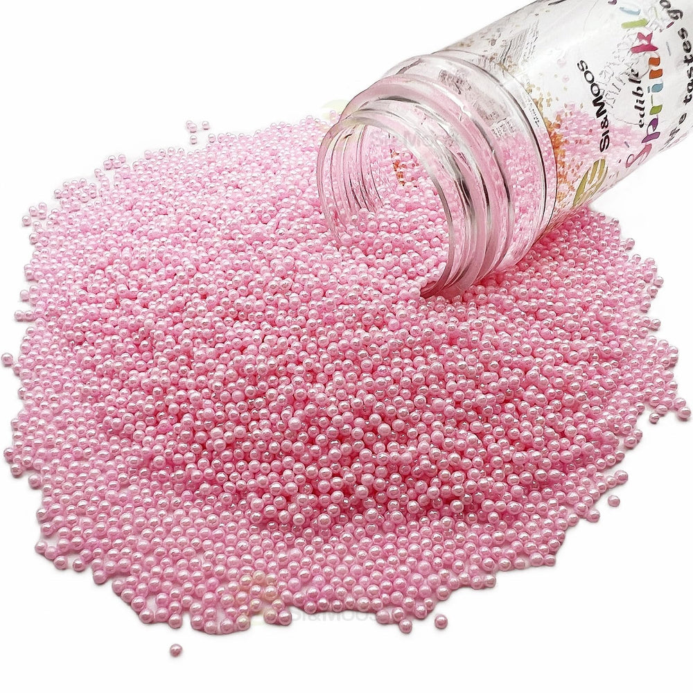 SE SI&MOOS cupcakes topping pink sprinkles for festive treats.