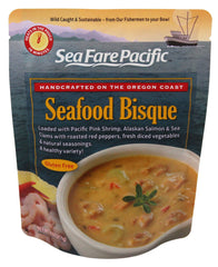 Sea Fare Pacific Seafood Bisque ingredients close-up highlighting shrimp, sockeye salmon, and clams.