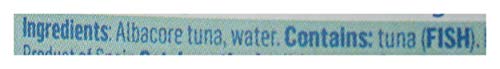 Sea Tales tuna flakes close-up reveal pale pink texture for salads or sandwiches.