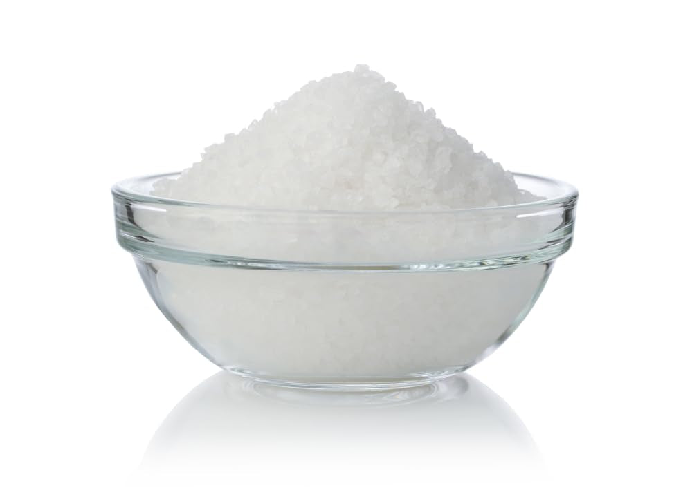 Seasonello iodine-enriched salt on a kitchen counter among fresh ingredients