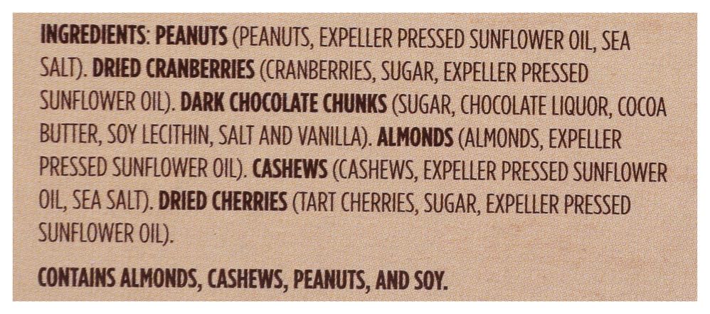 Second Nature Wholesome Medley Trail Mix ingredients are showcased with colorful nuts and fruits.