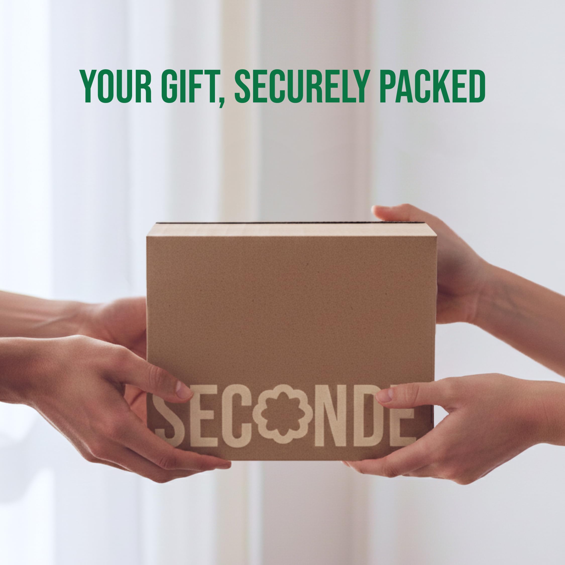 Seconde Nature Snack Box packaging in hand, easy gifting on the go.