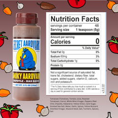 Pouring Secret Aardvark chipotle sauce enhances tacos and veggies.