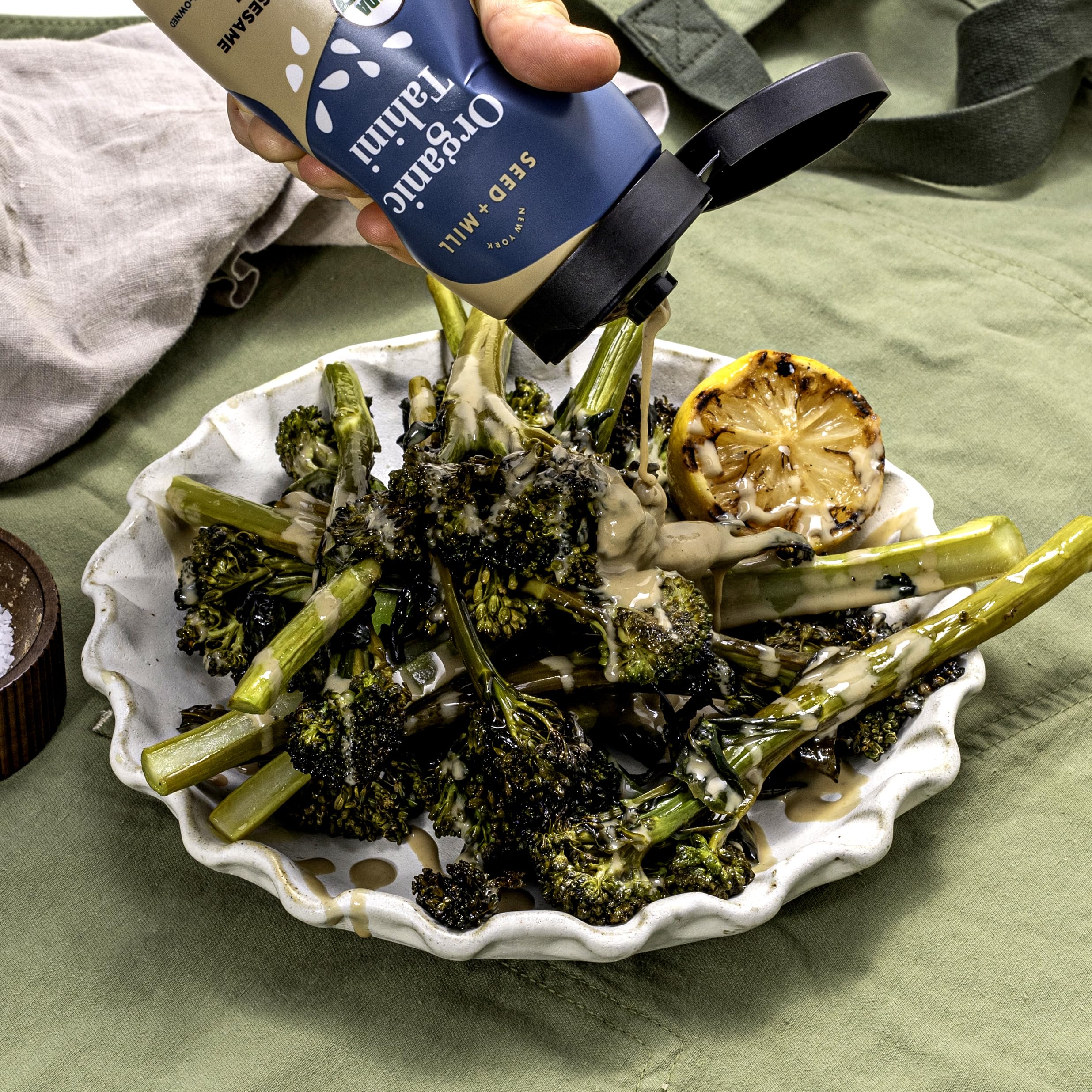 Seed + Mill tahini used in dips and dressings on a plate with rich flavor