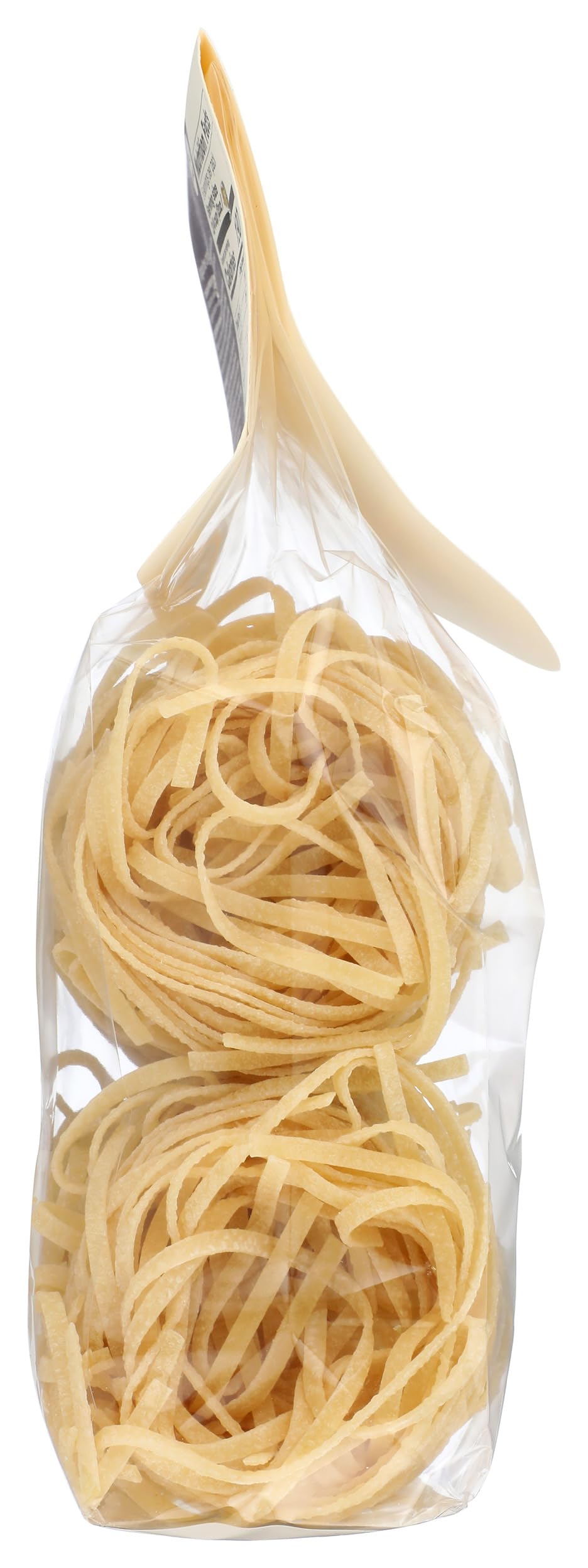 Seggiano Organic Linguine stacked neatly, a gourmet kitchen centerpiece.