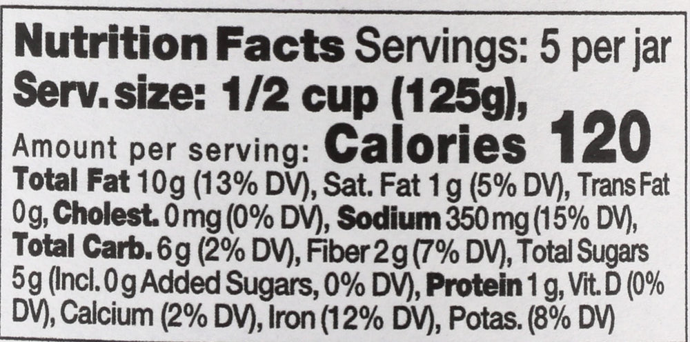 Seggiano organic puttanesca sauce bottle on a kitchen counter for easy weeknight meals.