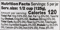 Seggiano organic puttanesca sauce bottle on a kitchen counter for easy weeknight meals.