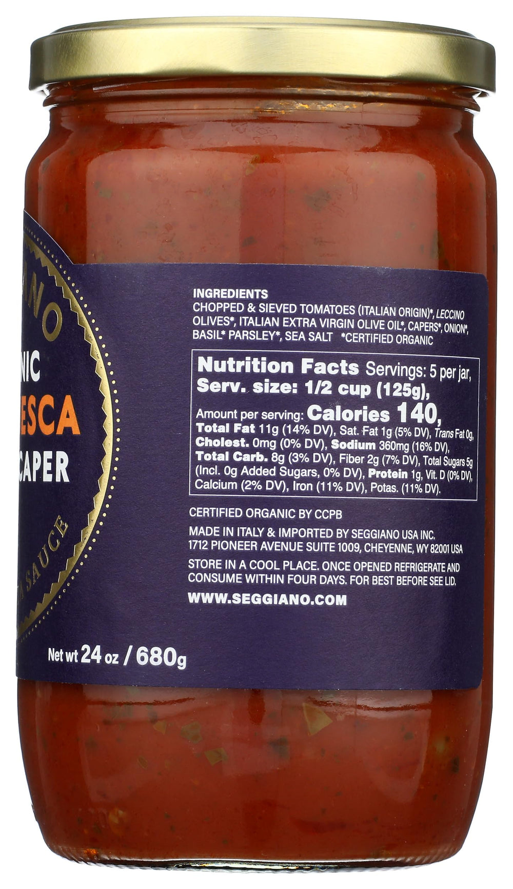 Seggiano organic puttanesca pasta sauce in a steaming bowl over pasta.