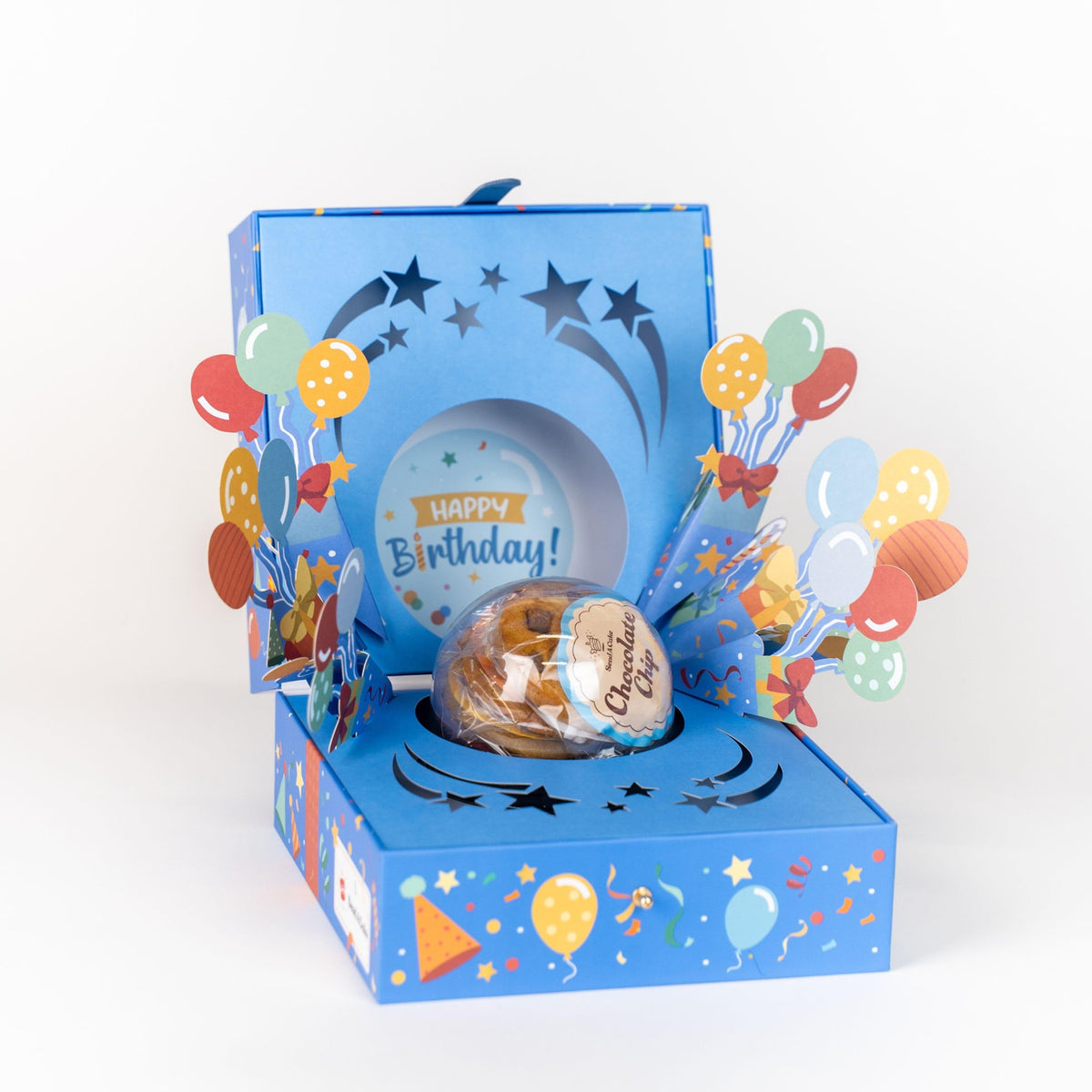 Send A Cake Happy Birthday Bloom Box front packaging enhances gift appeal with festive colors.