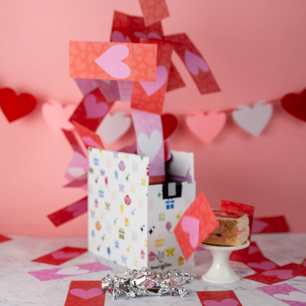 Send A Cake Roses & Charms unboxing ready gift box delights recipients.