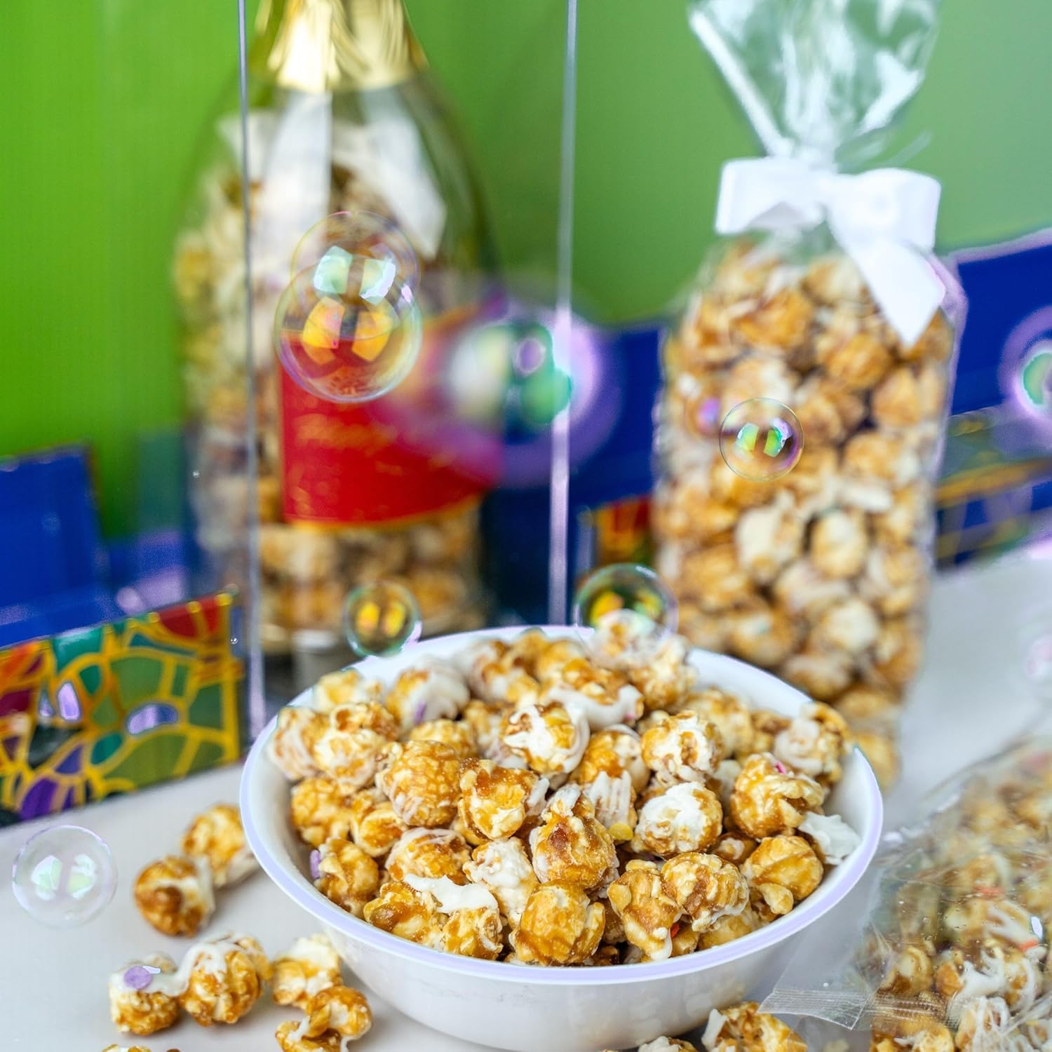 Send A Cake Surprise action shot—sudden popping bubbles create festive mood.