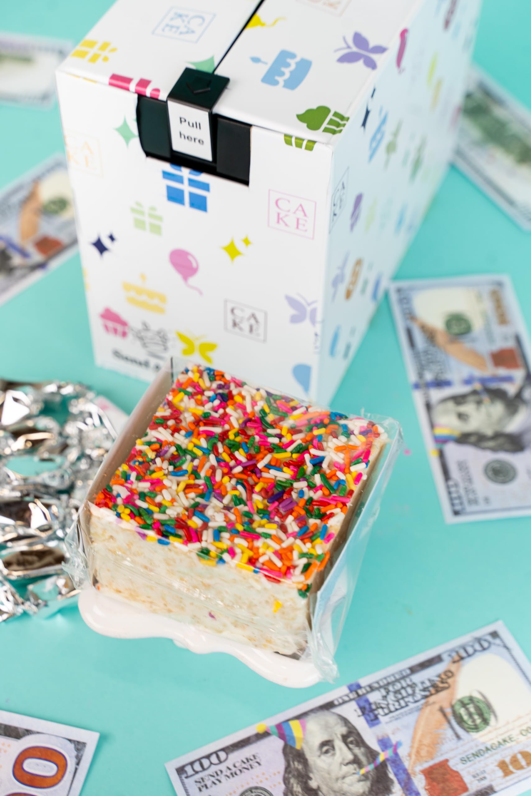 Send A Cake Celebration music cue enhances the unboxing moment.