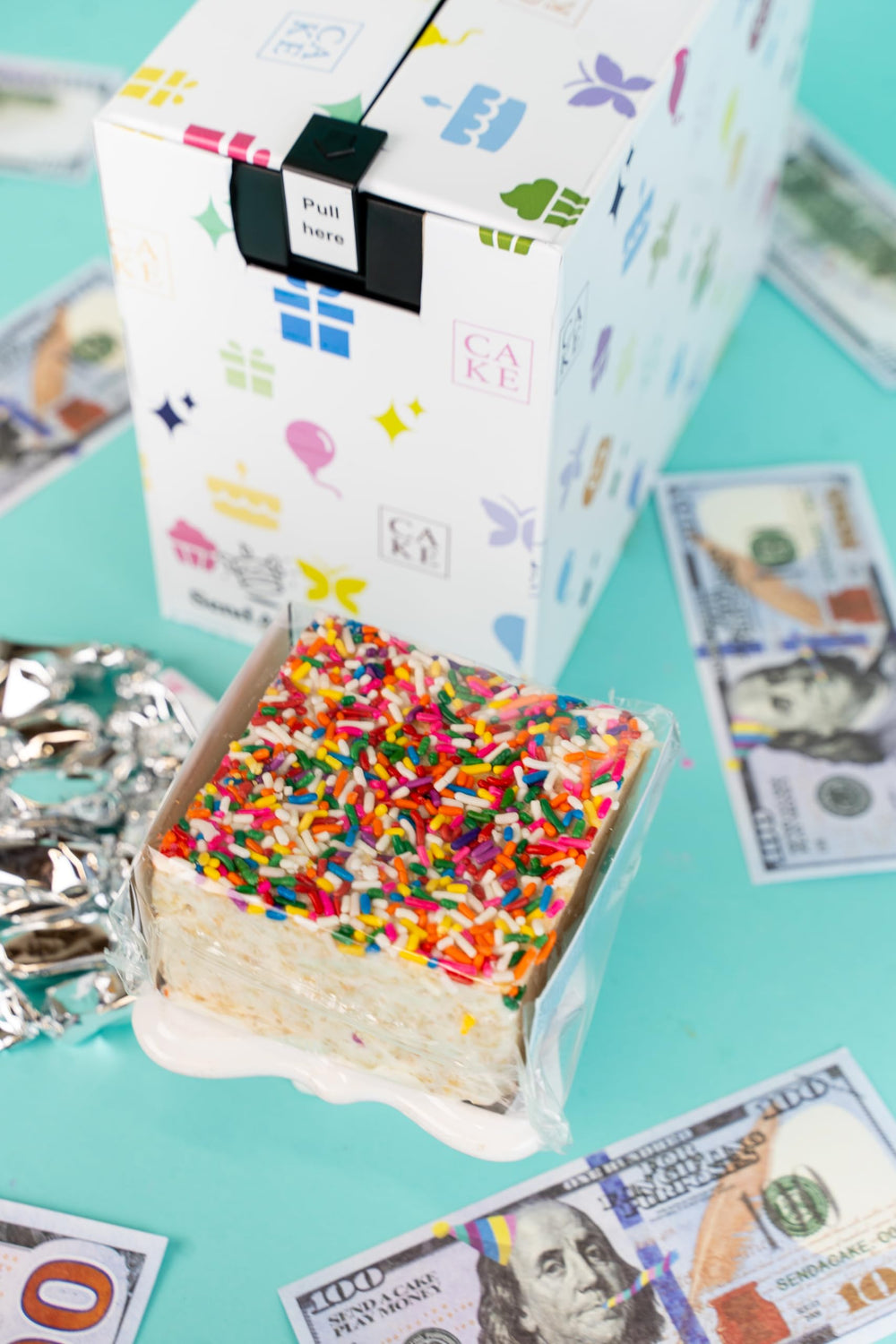Send A Cake Celebration music cue enhances the unboxing moment.