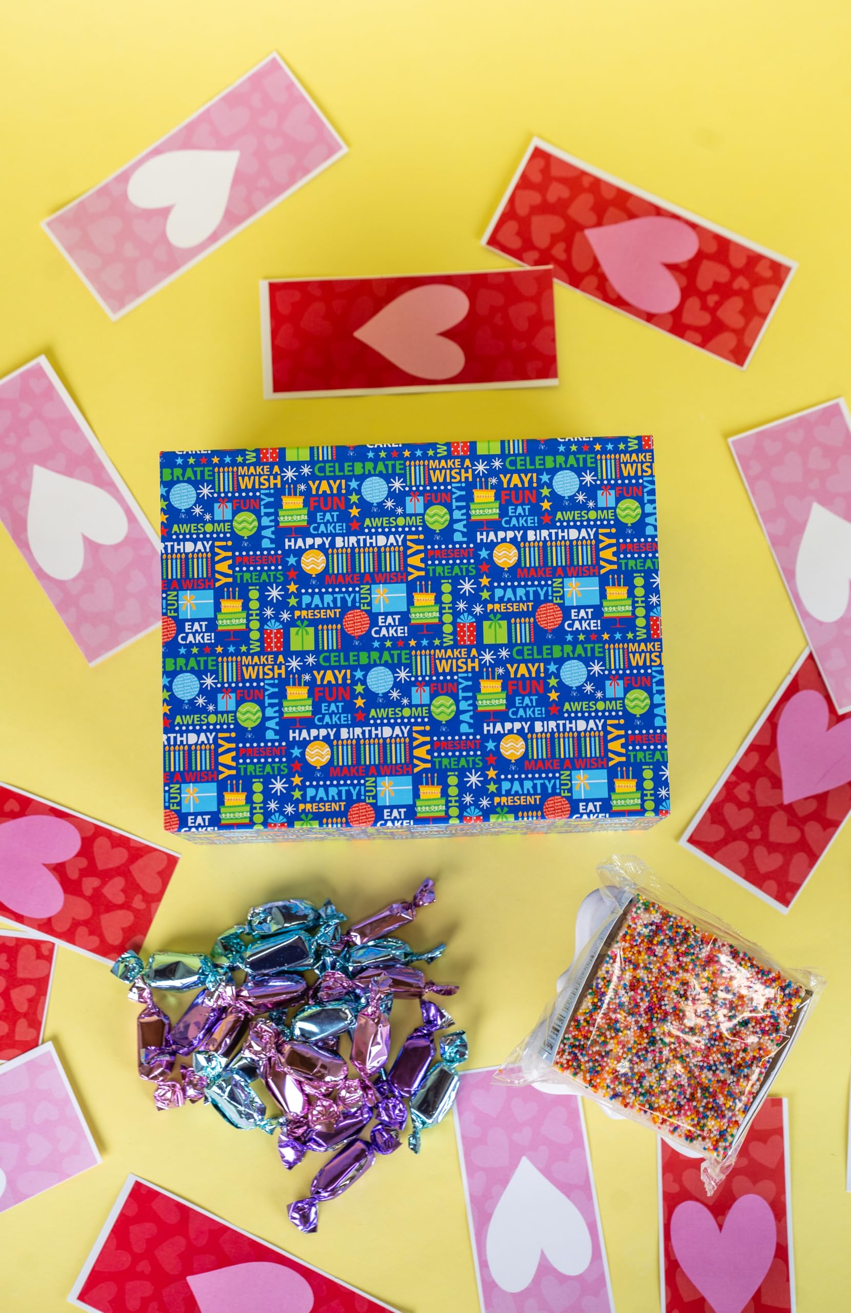 Foil-wrapped caramels in pink, blue, and purple from Send A Cake.