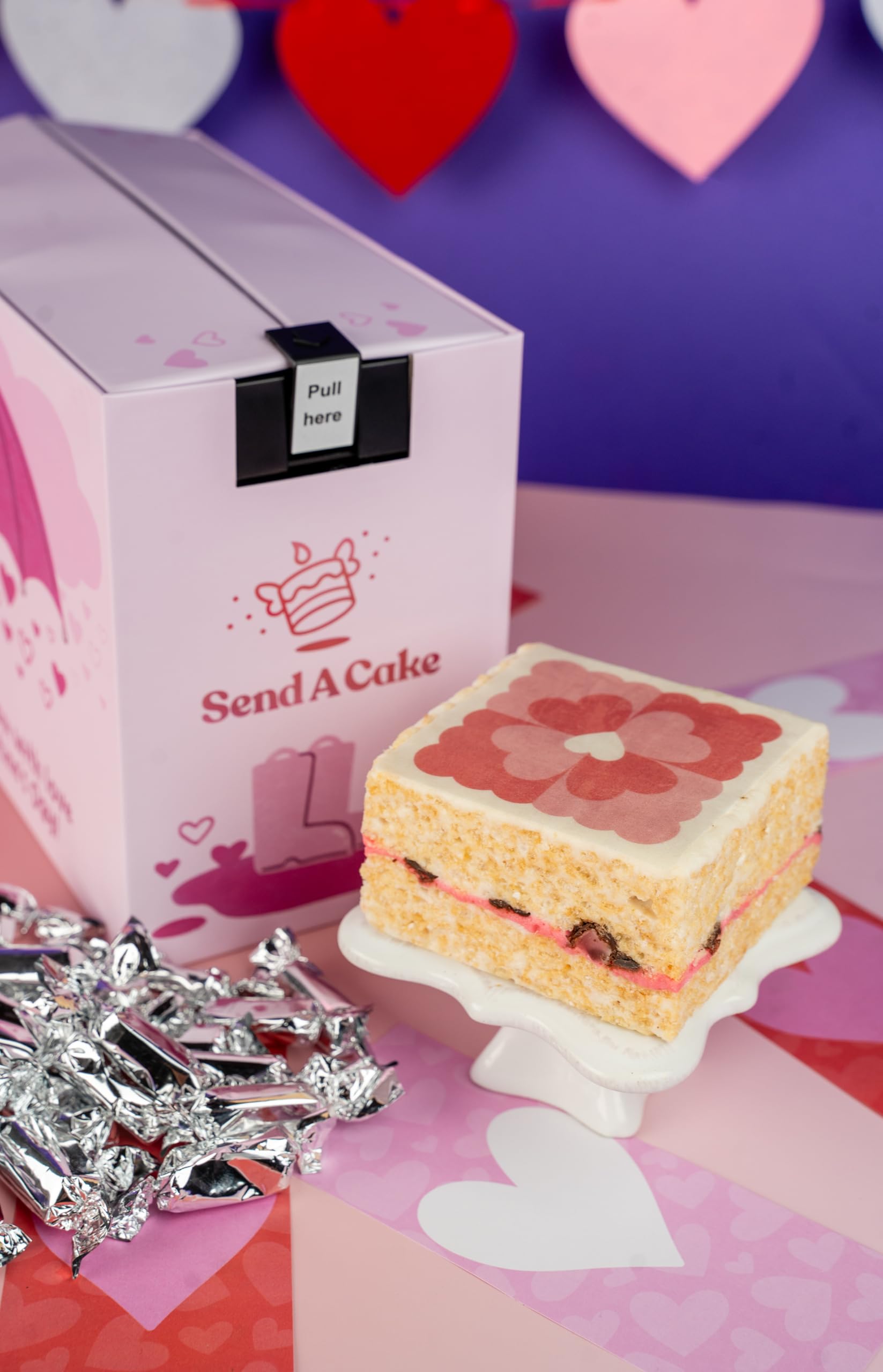 Send A Cake silver-wrapped caramels arranged for luxe bites.