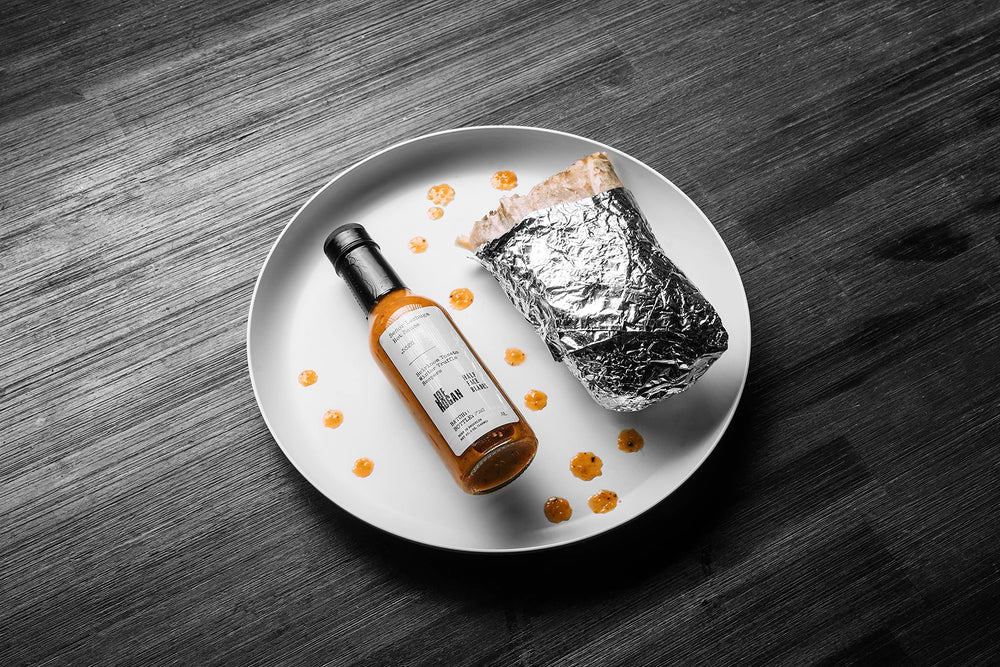 Senor Lechuga Reaper hot sauce bottle delivers fiery heat for wings and tacos.