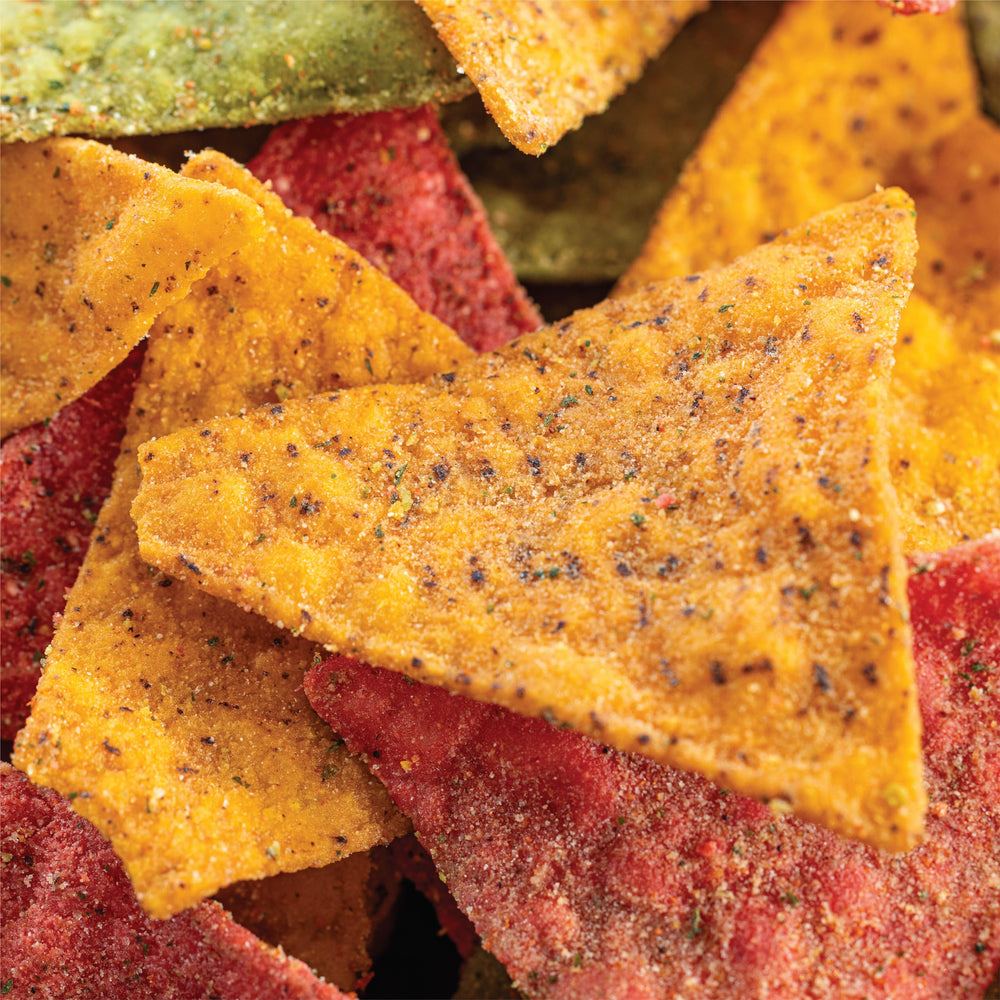 Close-up Ranch-flavored chips with visible corn and veggie bits