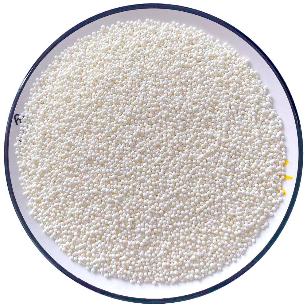 Sentovac white nonpareils 2mm bottle adds a glossy finish to cakes