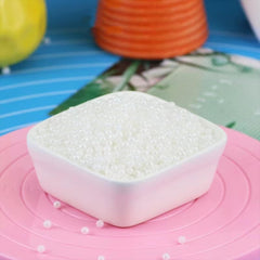 Sentovac white nonpareils embellish cookies for a refined look