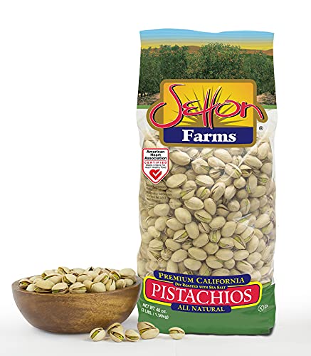 1-ounce serving of Setton Farms pistachios on a plate, convenient post-workout fuel.
