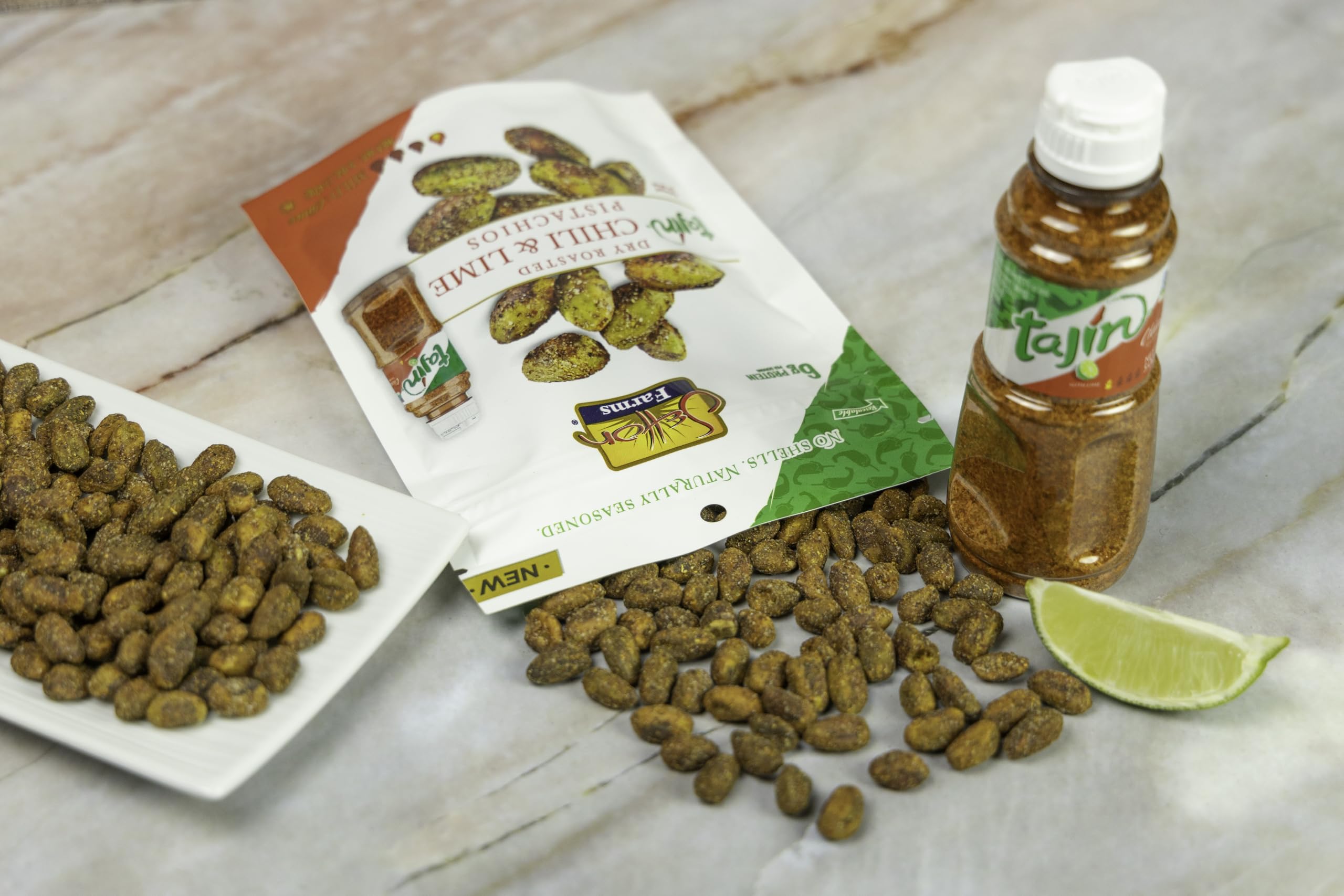 Packaging shows Setton Farms Tajin Clasico pistachios in a 20 oz bag.