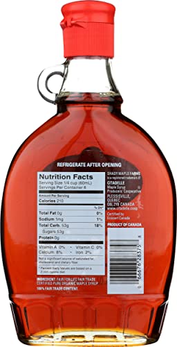 Shady Maple Farm maple syrup poured over pancakes for drizzle