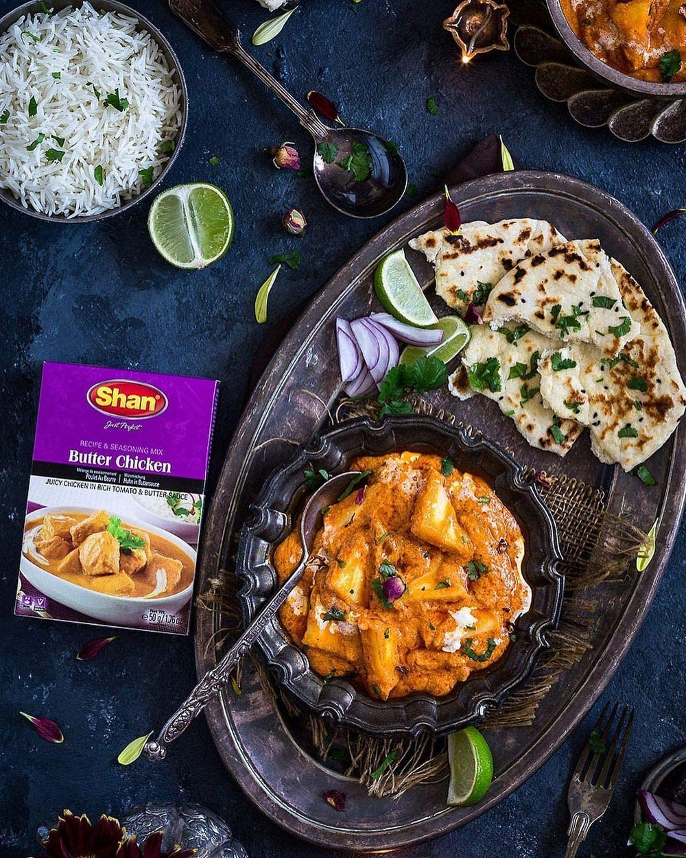 Fresh ginger and green chilies added to Shan Butter Chicken