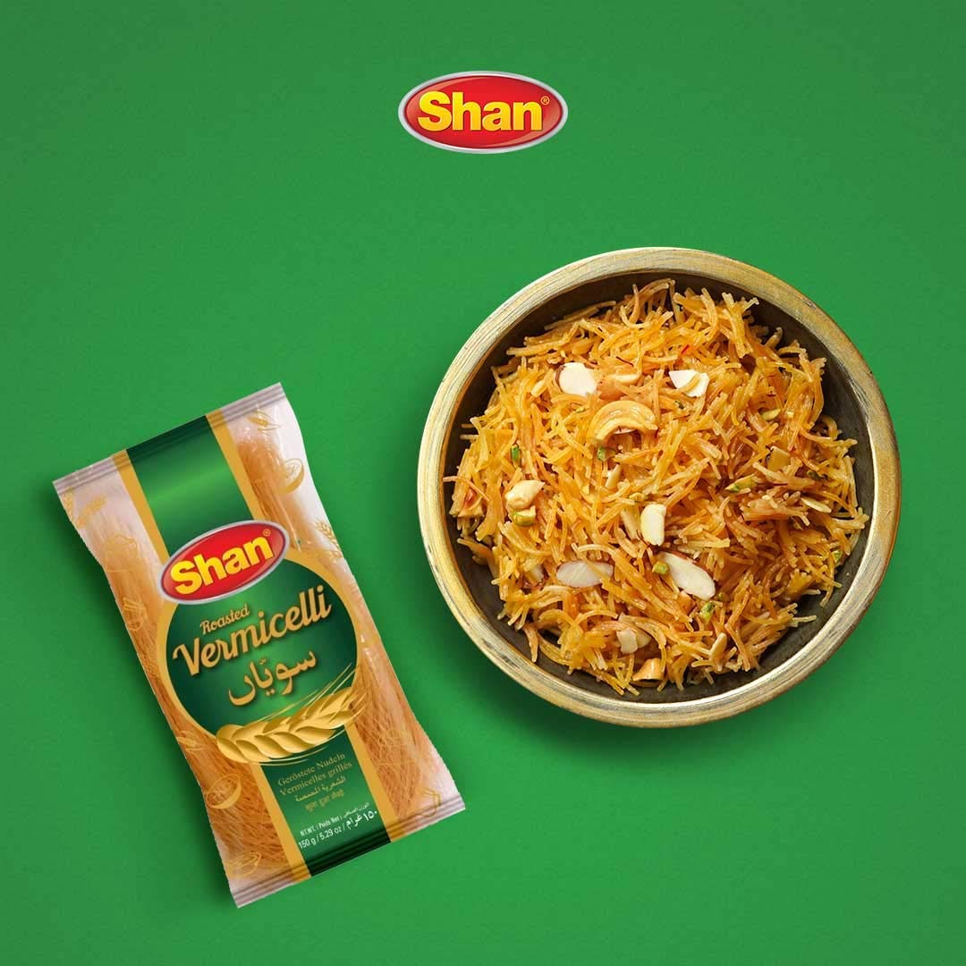 Shan Roasted Vermicelli simmering to tender texture in pot.