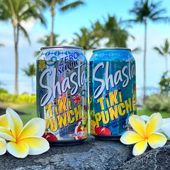 Shasta Tiki Punch set against a sunny tropical backdrop, poolside appeal.