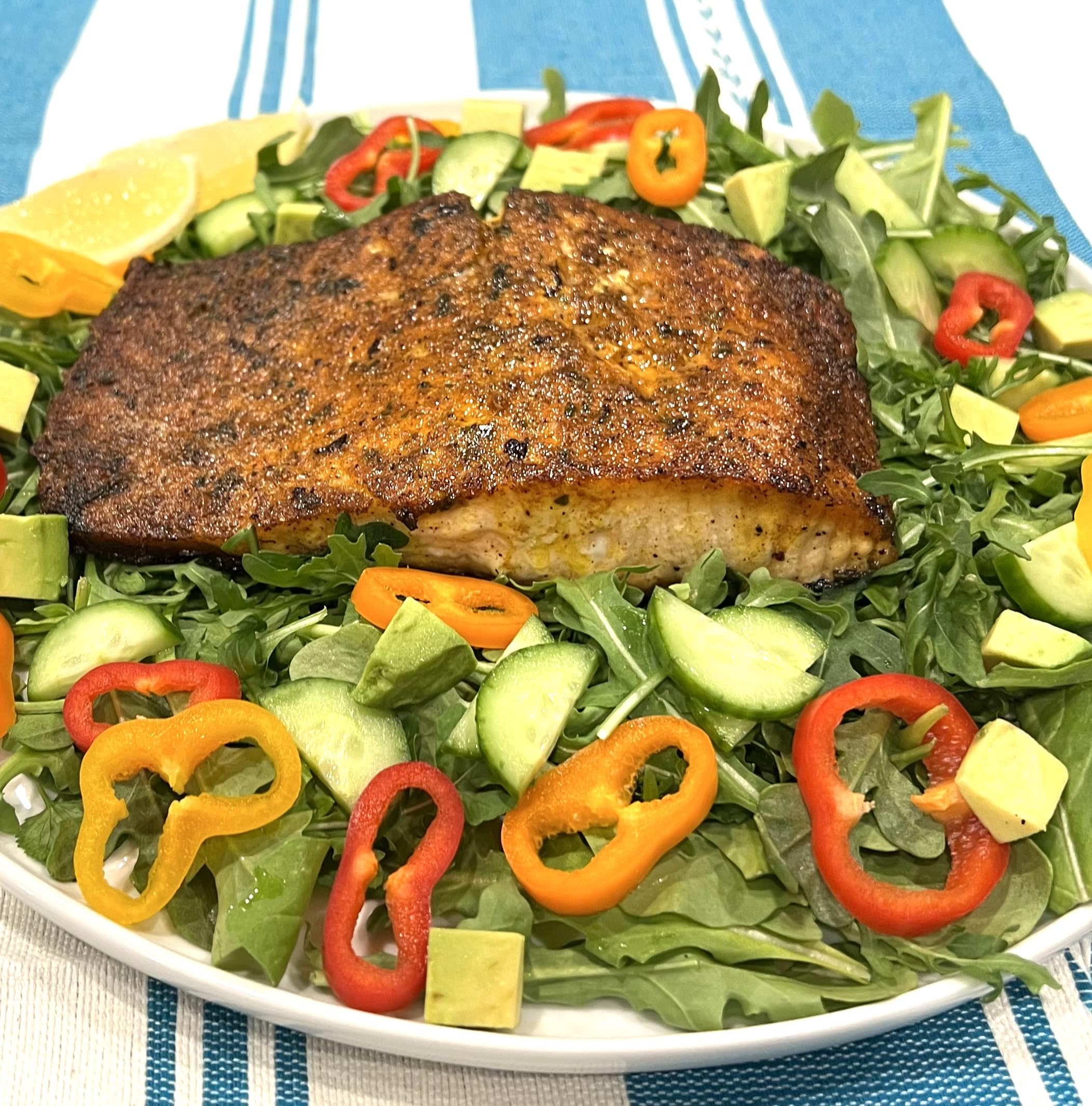 Shawarma spice sprinkled on chicken for restaurant-style flavor at home.