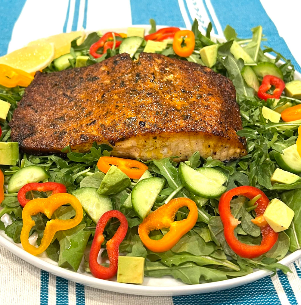 Shawarma spice sprinkled on chicken for restaurant-style flavor at home.