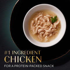 Peel-and-serve cups let you top your cat's meals with Sheba Filets in Broth