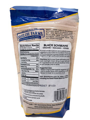 Close-up of dry black soybeans from Shiloh Farms, premium organic beans for rich soups and stews.