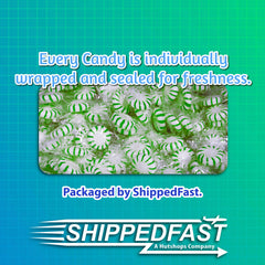 Close-up of Spearmint Starlight Candy mint swirl with glossy wrappers.