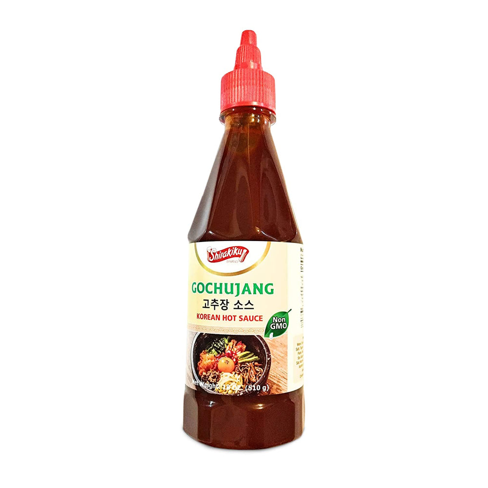 Shirakiku Gochujang bottle pouring sauce for quick flavor boost.