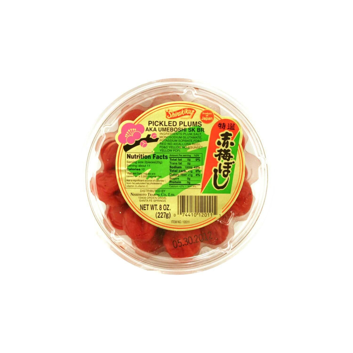 Shirakiku Umeboshi bottle pouring for rich dressings and sauces.