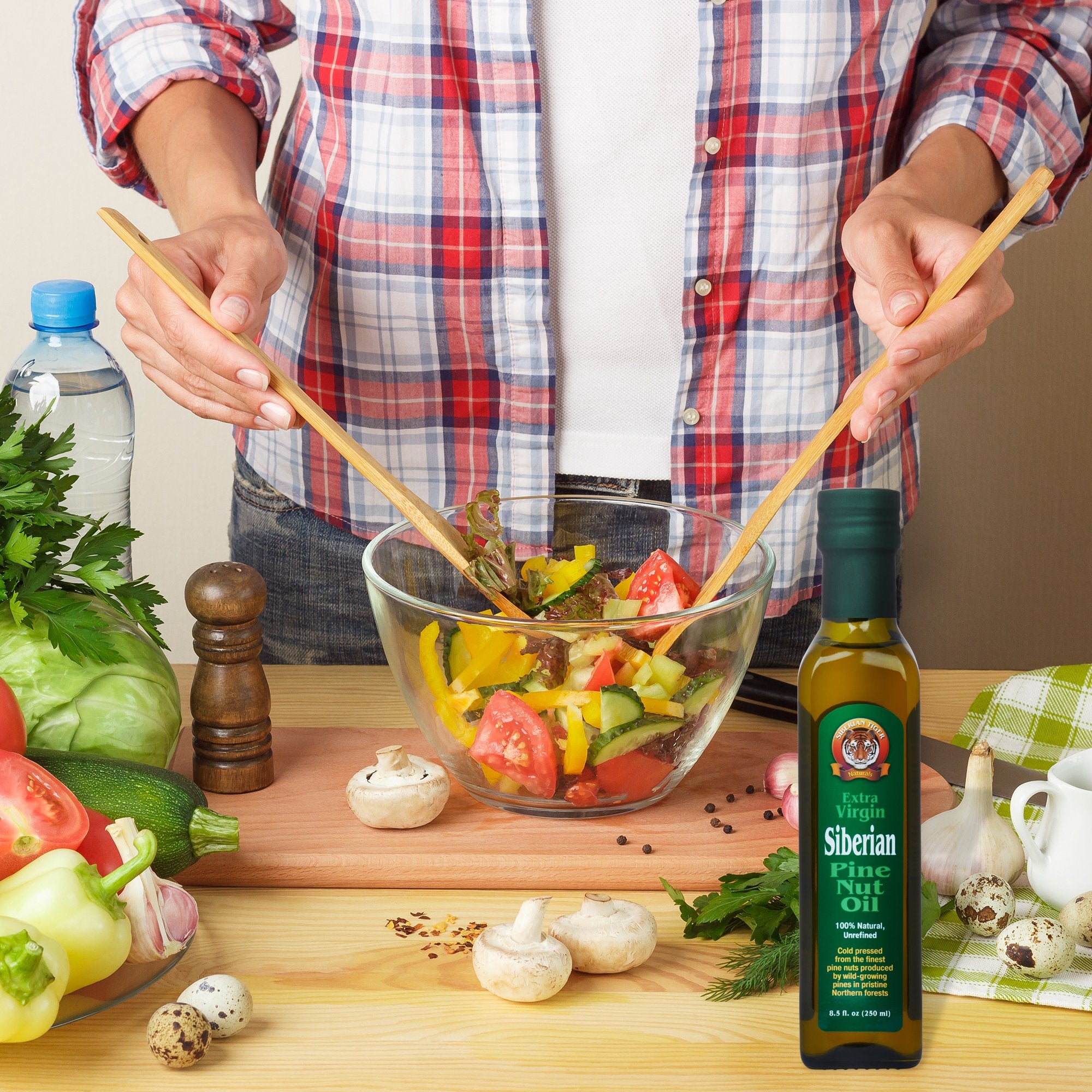 Siberian Tiger Naturals pine nut oil drizzle over a fresh salad
