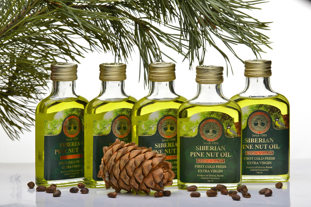 Siberian Treasure pine nut oil in kitchen setting ready to drizzle