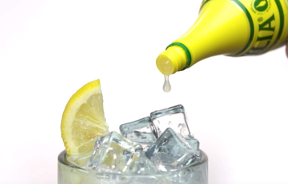 Sicilia Lemon Juice sealed cap close-up, convenient 4oz packaging.