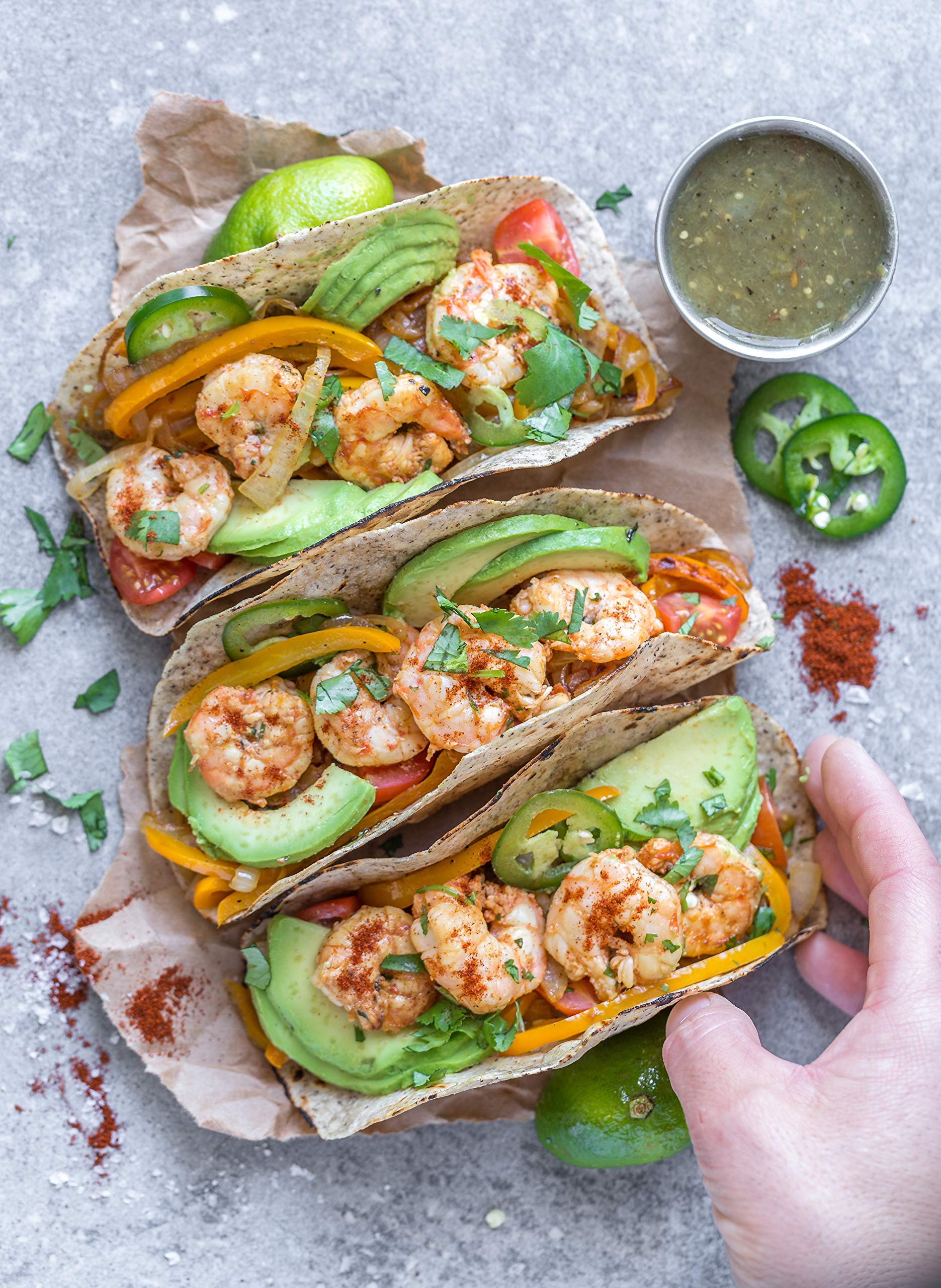 Siete Mild Taco Seasoning ingredients on board with colorful spices