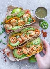 Siete Mild Taco Seasoning ingredients on board with colorful spices
